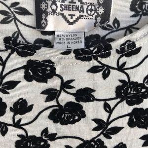 LARGE, long sleeved, stretch, top with flowers